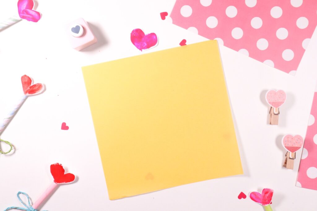 Valentines' Day thumbprint heart craft idea for kids - make a heart wand using paper 