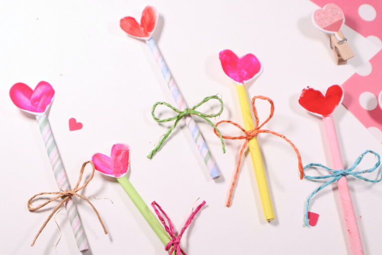 Thumbprint heart wand valentine’s Day craft for kids