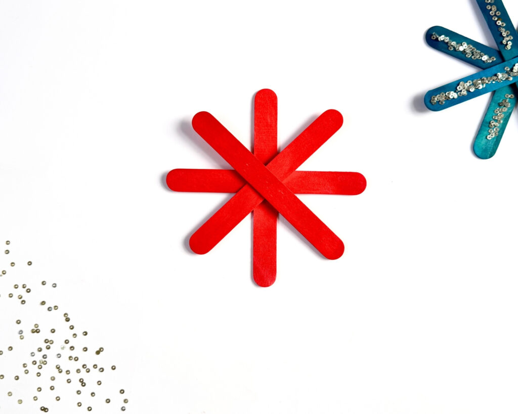 Popsicle stick snowflake ornament craft for kids